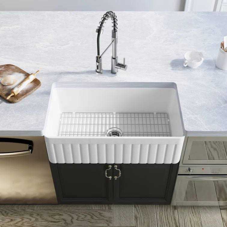 DeerValley Solstice White Fireclay 33 in. L x 18 in. W Rectangular Single Bowl Farmhouse Apron Kitchen Sink with Grid and Strainer DV-1K502 - Image 4