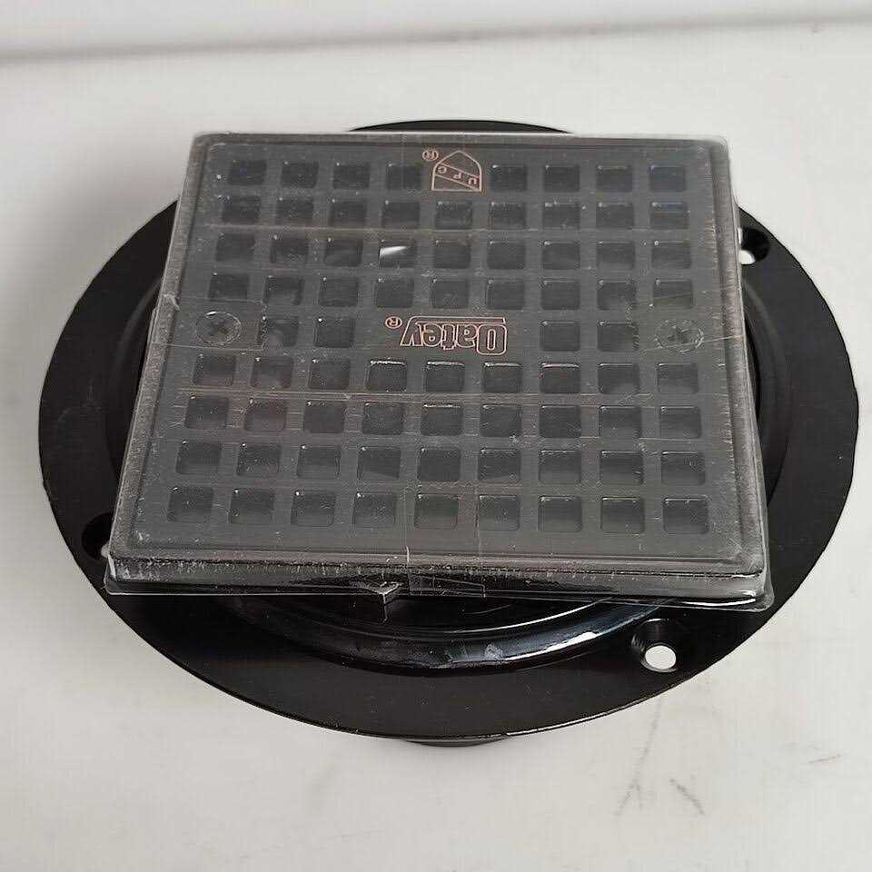 Oatey Round Black ABS Shower Drain with 4-3/16 in. Square Screw-in Oil Rubbed Bronze Drain Cover - Image 4